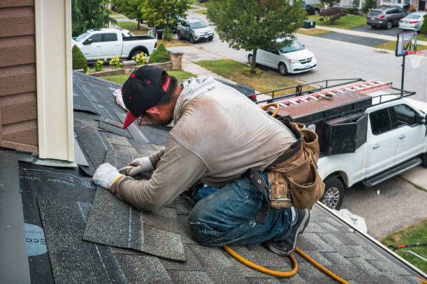 Professional Gutter Repair And Installation technician working in Lyndhurst, NJ